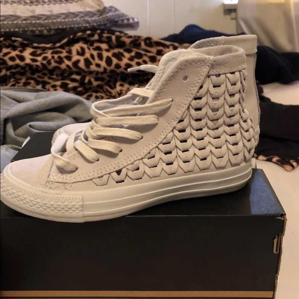 Converse suede high tops.
